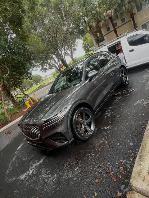 White BMW SUV after a Perfect Shine 305 exterior detail in a Miami driveway